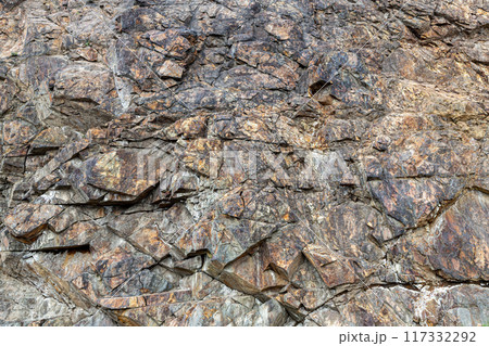 Iron ore texture close up - natural minerals in mine Iron ore texture close up - natural minerals in mine 117332292