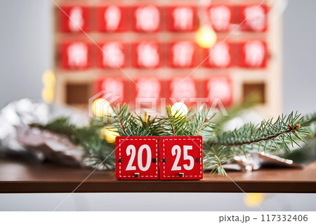 Two boxes from an Advent calendar that make up the number 2025. 117332406