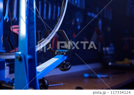 Manual device for straightening bicycle wheels closeup view 117334124
