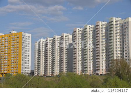 Sleeping area with high-rise buildings on a sunny spring day, Vidnoe, Moscow region, May 2022. Sleeping area with high-rise buildings on a sunny spring day, Vidnoe, Moscow region, May 2022. 117334187