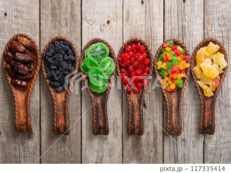 Group of dried and candied fruit in bowl Group of dried and candied fruit in bowl 117335414