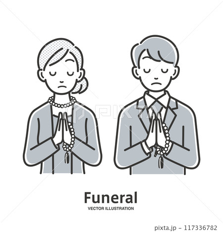 葬儀で手を合わせる男性と女性 117336782
