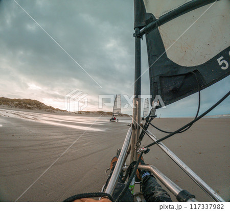 Blokart beach sailing in Terschelling island in the Wadden Sea - Holland or the Netherlands Blokart beach sailing in Terschelling island in the Wadden Sea - Holland or the Netherlands 117337982