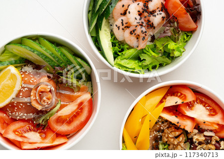 Tasty take out poke bowls isolated on white background 117340713
