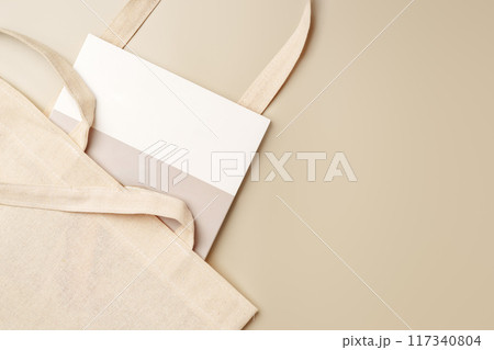 Stack of paper and fabric bag, blank objects for placing your design 117340804