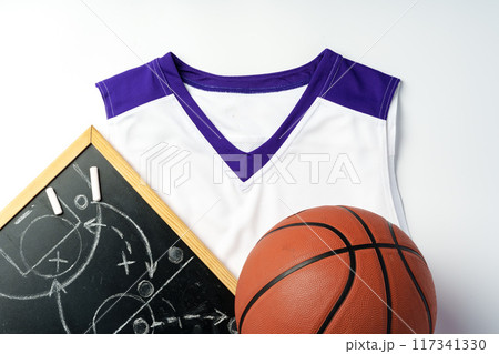 Basketball uniform on white background top view Basketball uniform on white background top view 117341330