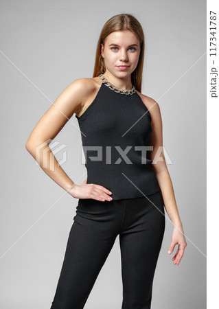Woman With Long Hair in Black Pants and Top Woman With Long Hair in Black Pants and Top 117341787