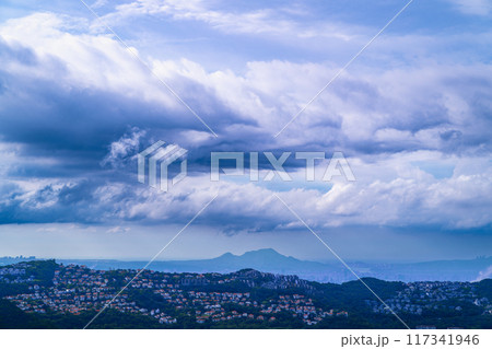 Afternoon clouds over Taipei City from a mountain observation deck. 117341946