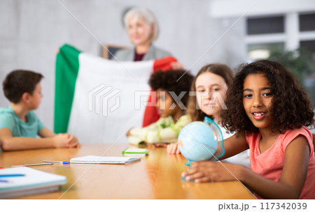 Ten-year-old schoolgirl is studying the history of Italy Ten-year-old schoolgirl is studying the history of Italy 117342039