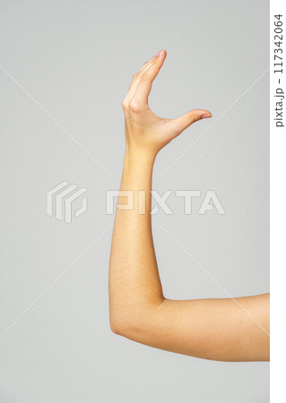 Young Woman Arm with Gesture close up 117342064
