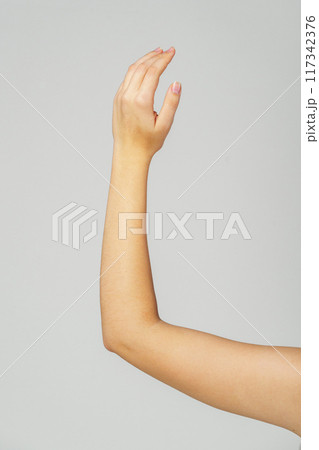 Young Woman Arm with Gesture close up Young Woman Arm with Gesture close up 117342376