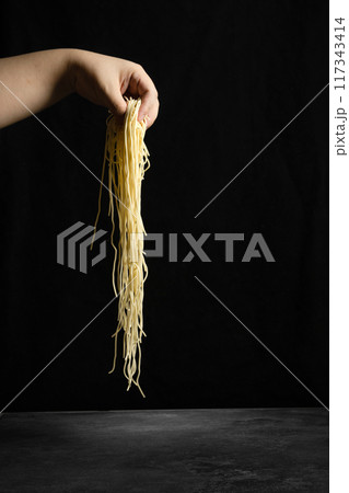 noodles in hand 117343414