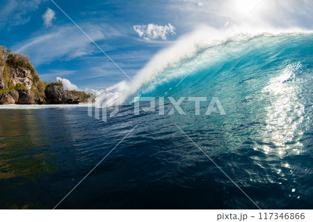 Wave in ocean. Breaking barrel wave with sunlight 117346866