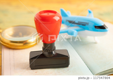 Approved Stamp visa and passport document to immigration at airport in country. 117347804