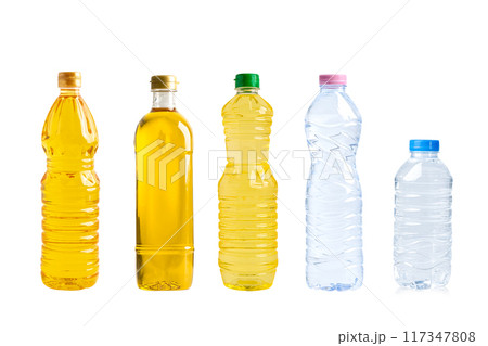 Vegetable oil and water in different bottle for cooking isolated on white background. Vegetable oil and water in different bottle for cooking isolated on white background. 117347808