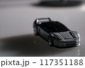 Where imagination meets reality: a solitary toy car captures the essence of childhood play 117351188