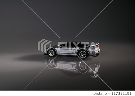 The stillness of the night surrounds this toy car, inviting memories of carefree days filled with exploration 117351191