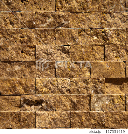 Cutting beige organic marble wall rectangular, seamless lined up Cutting beige organic marble wall rectangular, seamless lined up 117351419