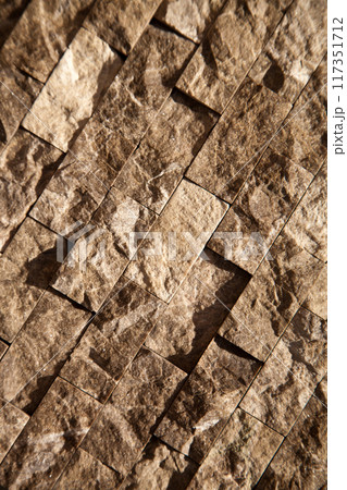 Cutting beige organic marble wall rectangular, seamless lined up Cutting beige organic marble wall rectangular, seamless lined up 117351712