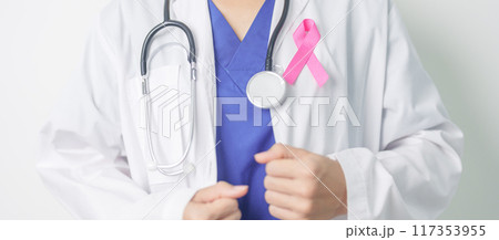 Pink October Breast Cancer Awareness month, woman doctor with pink Ribbon in hospital for support people life and illness. National cancer survivors month, Mother and World cancer day concept Pink October Breast Cancer Awareness month, woman doctor with pink Ribbon in hospital for support people life and illness. National cancer survivors month, Mother and World cancer day concept 117353955