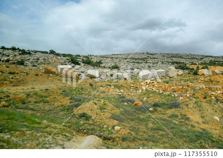 Marble quarry quarrying white marble in open pit 117355510