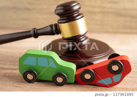 Hammer gavel judge with car vehicle accident, insurance coverage claim lawsuit court case. 117361895