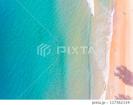 Beautiful sea beach and waves texture in sunny summer day background Beautiful sea beach and waves texture in sunny summer day background 117362134