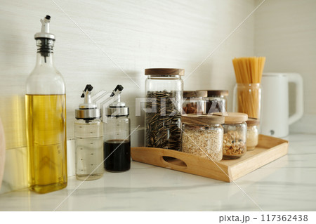 Spices And Oil On Kitchen Table 117362438