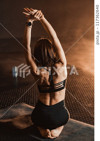 Discover the Dynamic Yoga Pose, a powerful back...の写真素材 [117362640] - PIXTA