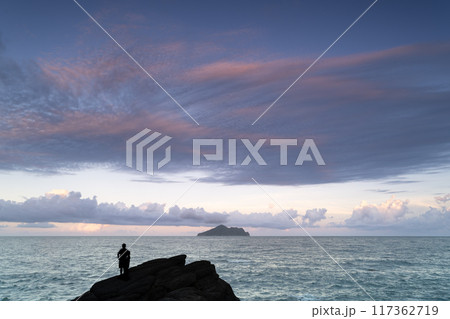 Turtle Island across the ocean on the horizon. Turtle Island across the ocean on the horizon. 117362719