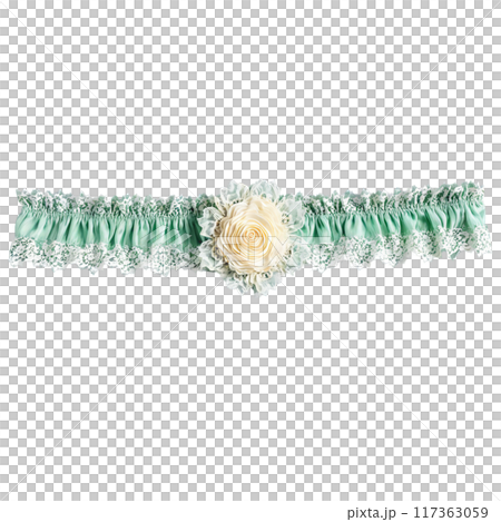 Pastel green lace garter with rosette detail floating upwards delicate and detailed isolated Pastel green lace garter with rosette detail floating upwards delicate and detailed isolated 117363059