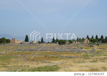 Antique ruins and limestone blocks in Hierapolis, Turkey. Ancient city. Antique ruins and limestone blocks in Hierapolis, Turkey. Ancient city. 117363247