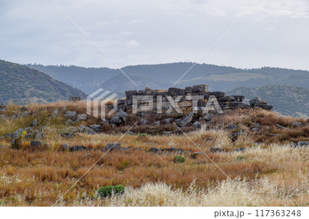 Antique ruins and limestone blocks in Hierapolis, Turkey. Ancient city. Antique ruins and limestone blocks in Hierapolis, Turkey. Ancient city. 117363248