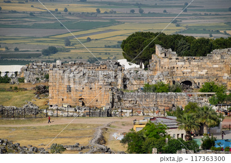 Antique ruins and limestone blocks in Hierapolis, Turkey. Ancient city. Antique ruins and limestone blocks in Hierapolis, Turkey. Ancient city. 117363300
