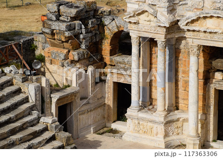 Antique columns and arches in the Hierapolis amphitheater. 117363306