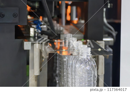 The drinking water bottle manufacturing process by blow mold machine. The drinking water bottle manufacturing process by blow mold machine. 117364017