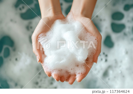 Female young hands with hygienic moisturizing foam over a full bathtub. Top view. Generative AI Female young hands with hygienic moisturizing foam over a full bathtub. Top view. Generative AI 117364624