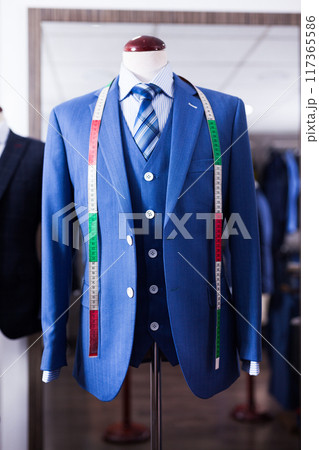 Jacket with shirt and tie on mannequin 117365586