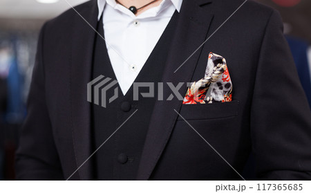 Jacket with shirt and tie on mannequin 117365685