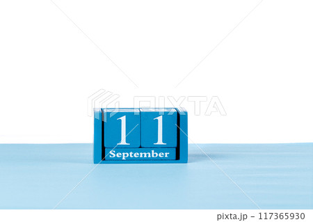 Wooden calendar September 11 on a white background 117365930