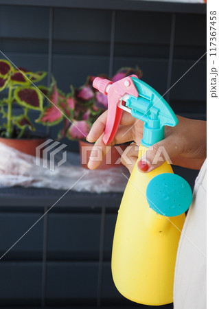 Colorful Handheld Spray Bottle for Caring for Your Indoor Plants and Maintaining Their Health 117367458