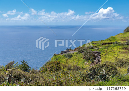 View of the ocean from a hill above the town of Calheta on the island of Madeira 117368739