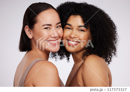 Diversity, beauty and portrait of women for skincare, wellness and body positivity in studio. Dermatology, self love and face of Asian and black girl for luxury cosmetics, makeup and natural glow 117373327