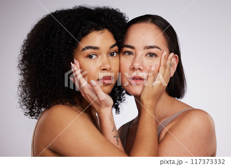 Beauty, facial and portrait of women for skincare, spa wellness and dermatology in white studio. Diversity, self care and face of Asian and black girl for luxury cosmetics, makeup and natural glow 117373332
