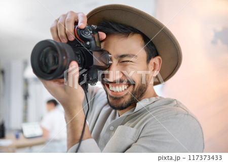 Photography, camera and man in studio shooting creative memory picture, photoshoot session or digital production. Lens focus, art creativity and young excited photographer working for artistic shot 117373433