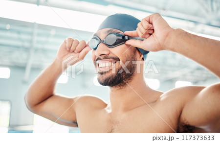 Swimming athlete, happy man and start race, fitness and exercise at pool, motivation and active lifestyle. Water sports, smile on face and workout, training for health and wellness with sport goggles Swimming athlete, happy man and start race, fitness and exercise at pool, motivation and active lifestyle. Water sports, smile on face and workout, training for health and wellness with sport goggles 117373633