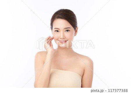 Beautiful young asian woman with clean fresh skin on white background, Face care, Facial treatment, Cosmetology, beauty and spa, Asian women portrait. Beautiful young asian woman with clean fresh skin on white background, Face care, Facial treatment, Cosmetology, beauty and spa, Asian women portrait. 117377388