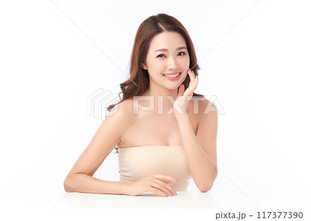 Beautiful young asian woman with clean fresh skin on white background, Face care, Facial treatment, Cosmetology, beauty and spa, Asian women portrait. Beautiful young asian woman with clean fresh skin on white background, Face care, Facial treatment, Cosmetology, beauty and spa, Asian women portrait. 117377390