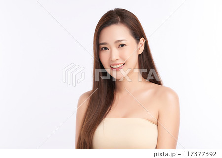 Beautiful young asian woman with clean fresh skin on white background, Face care, Facial treatment, Cosmetology, beauty and spa, Asian women portrait. Beautiful young asian woman with clean fresh skin on white background, Face care, Facial treatment, Cosmetology, beauty and spa, Asian women portrait. 117377392