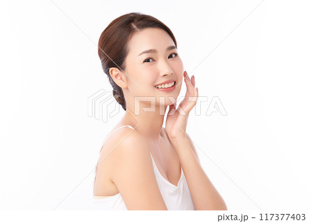 Beautiful young asian woman with clean fresh skin on white background, Face care, Facial treatment, Cosmetology, beauty and spa, Asian women portrait. Beautiful young asian woman with clean fresh skin on white background, Face care, Facial treatment, Cosmetology, beauty and spa, Asian women portrait. 117377403